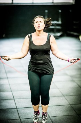 Ms Lavars during a CrossFit workout before she was diagnosed with depression. 