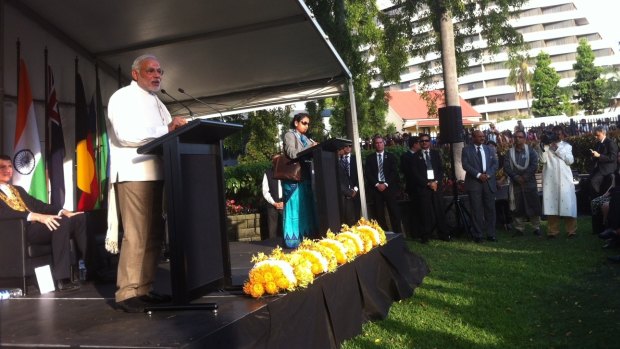 Indian Prime Minister Narendra Modi unveils a statue for Mahatma Gandhi in Brisbane.