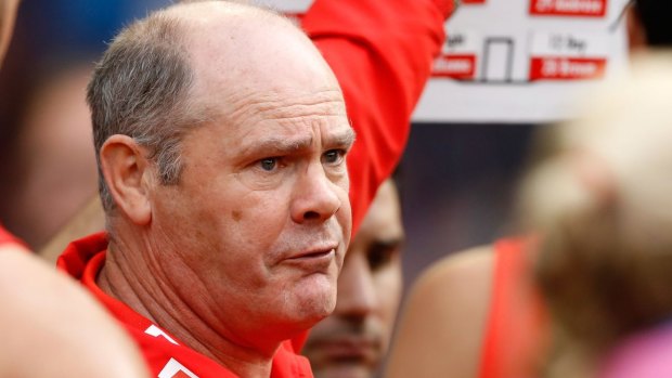 Rodney Eade addresses his players during the game against the Bombers.