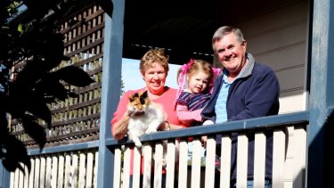 Works for us: Enjoying  family life across generations, Carol and Bruce Muston with their grand-daughter Evie.