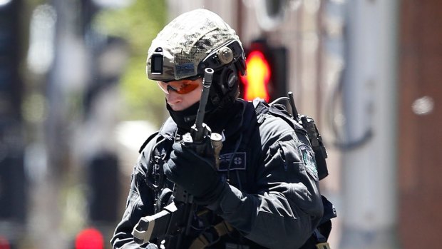 Two officers fired 22 rounds at gunman Man Haron Monis. 