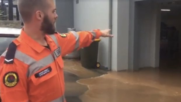 Water floods a property in Penrith after heavy rains from a storm system moving across NSW.