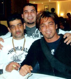 Shooting victim Michael Ibrahim (middle) poses with brothers Sam (left) and John.