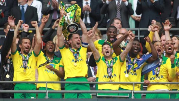 Ups and downs: Canary-coloured UK footballers enjoy Heaven of promotion.