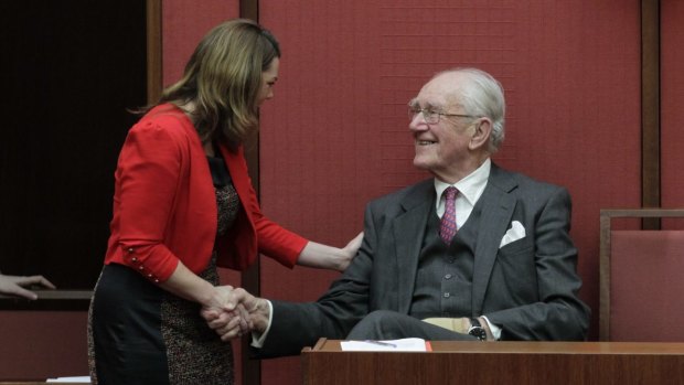 Senator Sarah Hanson-Young wither former prime minister Malcolm Fraser after she spoke against the Migration Amendment Bill in the Senate in August 2012. 