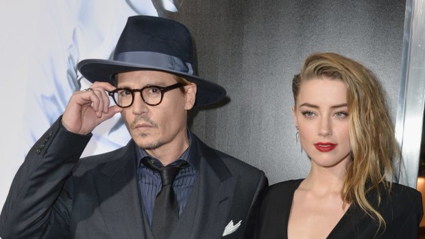 Actor Johnny Depp, pictured with wife Amber Heard, has left Australia, but its for his daughter, not his dogs. 