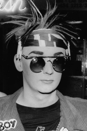 Boy George attends the opening of a fashion boutique in London in 1986.