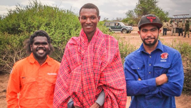 Imran and Conan, two of the Indigenous rangers who participated in the International Ranger Exchange, with a Maasai herdsman in Kenya. 