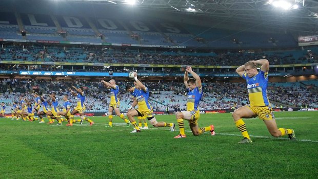 Stretched out: Eels players prepare for the round three match against the Canterbury Bulldogs