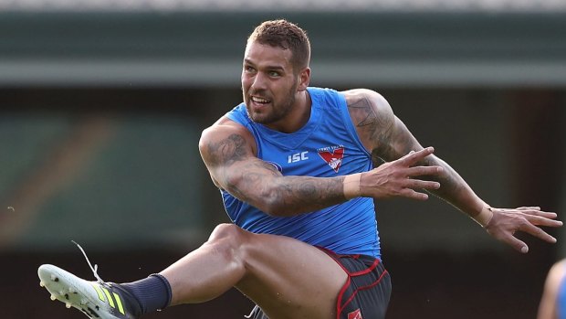 Comeback trail: Lance Franklin kicks at goal during the Swans' training session at the SCG after their defeat of the Bulldogs at the weekend.