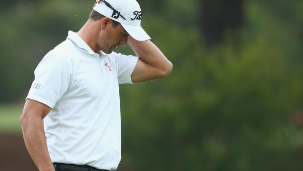 Frustrating morning: Adam Scott reacts after a missed putt on the 10th hole.