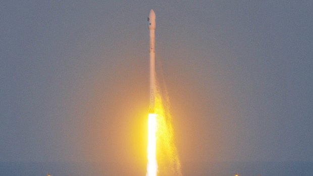 An unmanned Falcon 9 SpaceX rocket lifts off from launch complex 40 at the Cape Canaveral Air Force Station.