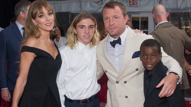 Rocco Ritchie with stepmother Jacqui Ainsley, father Guy Ritchie and brother David.