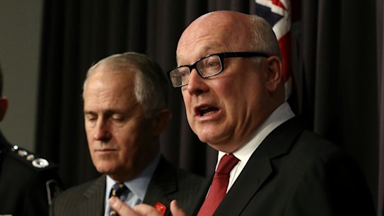AFP Commissioner Andrew Colvin, former communications minister Malcolm Turnbull, Attorney-General George Brandis.
