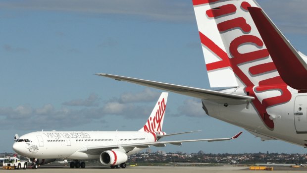 Virgin Australia said it narrowed its first-half statutory net loss. 