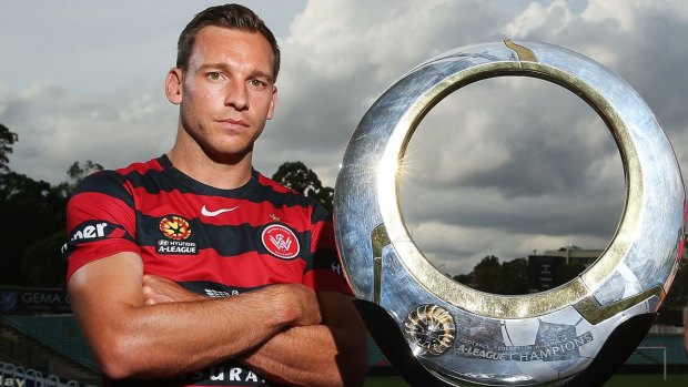 Valuable:  Brendon Santalab with the A-League trophy.