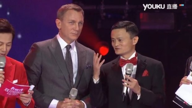 James Bond actor Daniel Craig, left, attends the extravagant live television Singles' Day gala launched by billionaire Alibaba founder Jack Ma, right.