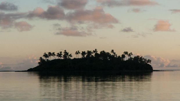 Tropical island at sunset, Rarotonga Island, Cook Islands. 