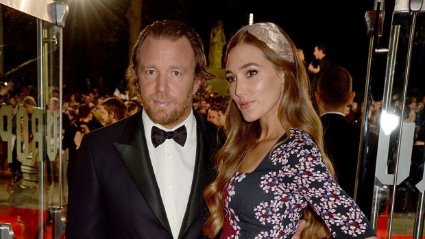 Guy Ritchie and Jacqui Ainsley attend the closing night Gala screening of <i>Fury</i> during the 58th BFI London Film Festival.