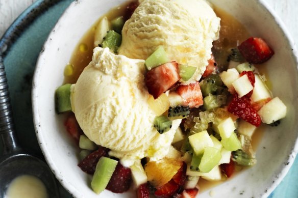 Ice-cream with fruit salad dressing.