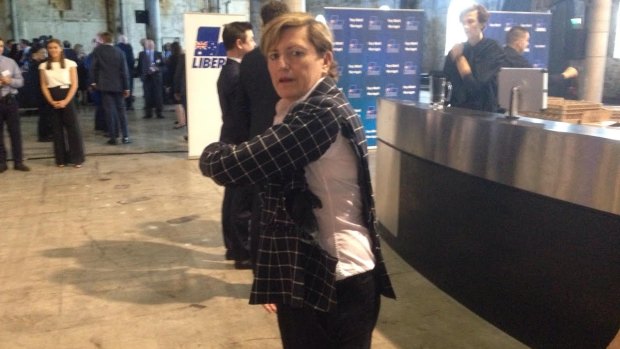Tony Abbott's sister, Christine Forster, says protesters badly ripped her jacket at the event.
