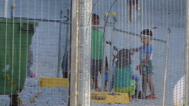 Children playing near the Refugee Processing Centre on Nauru.