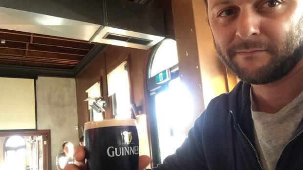 Prestipino enjoying a Guinness at The Windsor - the only beer it serves in a pint glass.