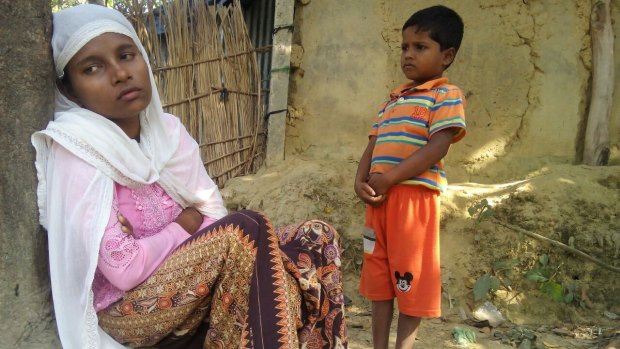 Rohingya refugee Jamalida Begum and her seven-year-old son Mohammad Ayaz at a refugee camp in Bangladesh.