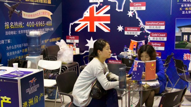 Australia booths at a Beijing property fair, promoting the chance to buy on the Sunshine Coast.