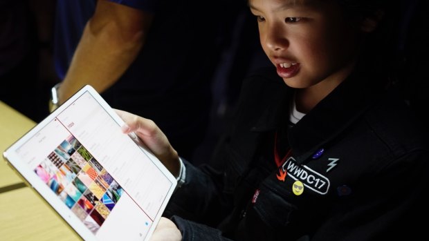 10-year-old Australian app developer Yuma Soerianto uses the new iPad Pro.
