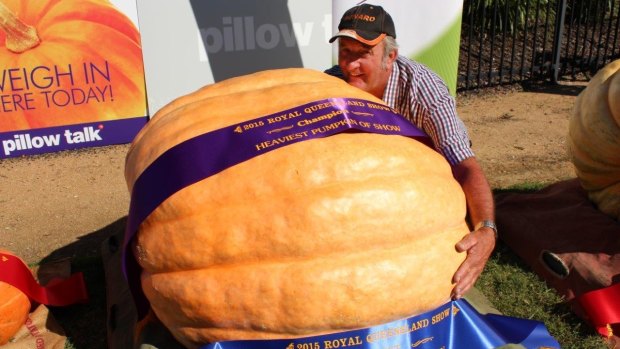 Minden farmer Geoff Frohloff with his 261-kilogram giant pumpkin, which won the 2015 Ekka best in show award.
