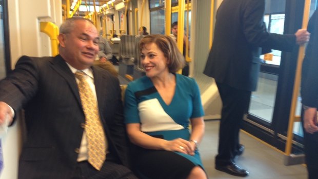 Gold Coast Mayor Tom Tate and Queensland Deputy Premier Jackie Trad take a ride on light rail.