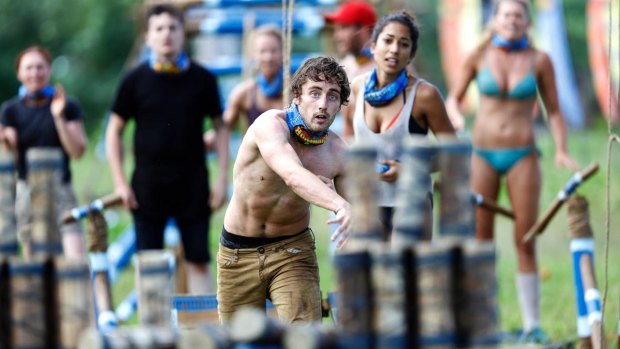 Canberra law student Conner competes in a challenge on Australian Survivor.
