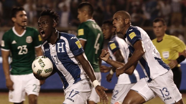Honduras' Alberth Elis celebrates his goal - in a result that ultimately booked his team a playoff with the Socceroos.