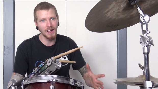Jason Barnes' robot prosthesis allows him to drum faster than an able-bodied drummer.