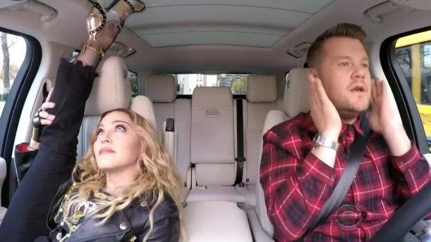 Madonna flexes on Carpool Karaoke with James Corden.