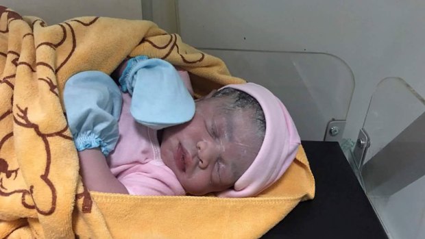 Cambodian Lux Clinic posted a photo of a minutes-old baby girl on Facebook following Hour Vanny's cesarean section on August 25. The surrogate mother confirmed the girl was the baby she carried.