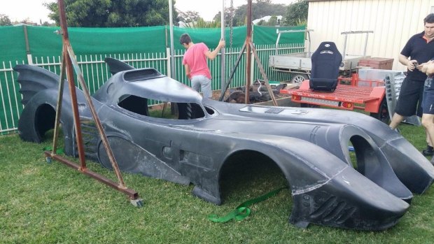Craig Blackburn and his sons are building a replica batmobile in their Toowoomba yard.