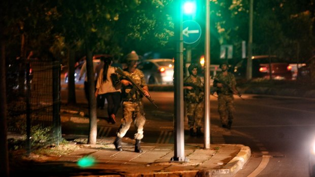 Turkish soldiers block Istanbul's Bosphorus Brigde after an attempted military coup.