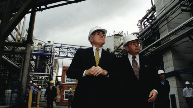 Manildra's Dick Honan shows then prime minister John Howard around the company's ethanol plant in Bomaderry.