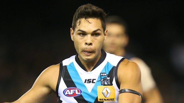 Hit in the pocket: Jarman Impey was fined $5000 by Port Adelaide this year.