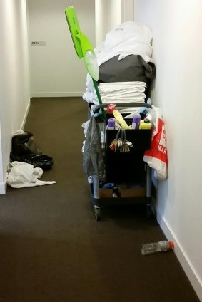 Cleaning equipment in the hallway of the Aura on Flinders residential apartment building.