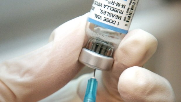 A Victorian woman diagnosed with measles may have infected others while travelling between Melbourne and Brisbane, but authorities still haven't identified the source.