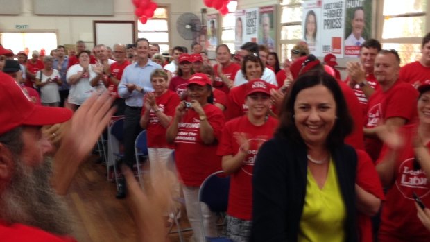 Supporters applaud Labor leader Annastacia Palaszczuk.
