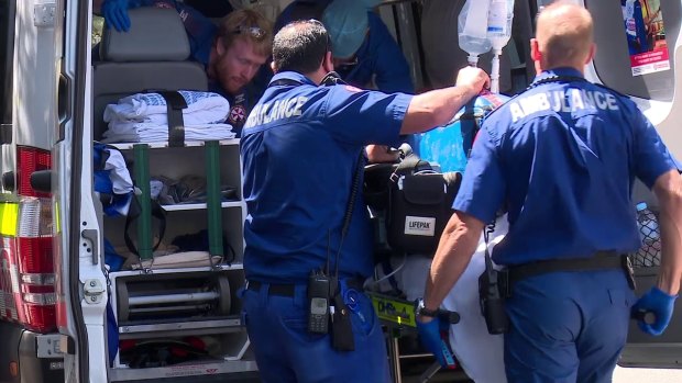 A woman was taken to hospital in a serious condition after falling unconscious at The Cosmetic Institute Parramatta in Sydney's west.