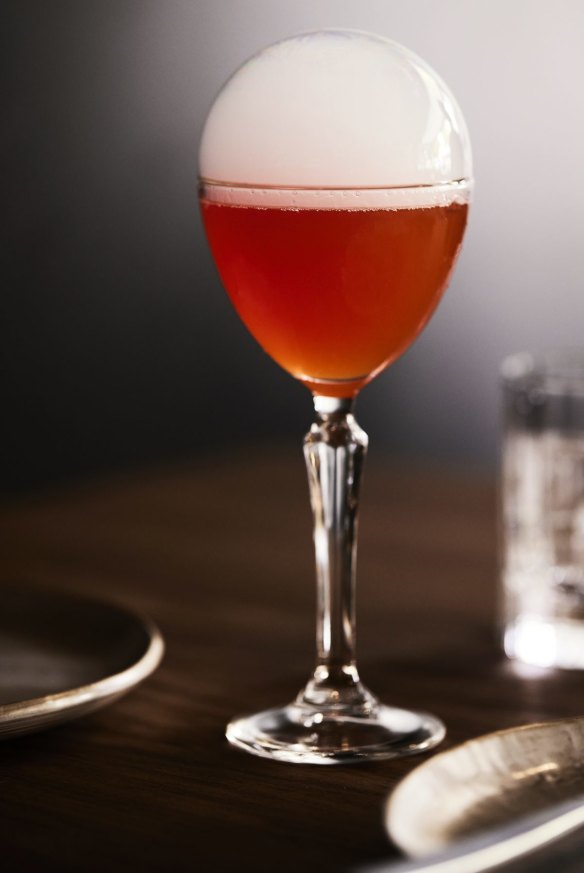 The bubble-topped Muriel's Passion cocktail combines Aperol, vanilla and passionfruit.