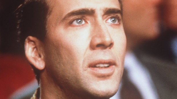 Nicolas Cage delivers a manic performance in <i>Snake Eyes</I>.