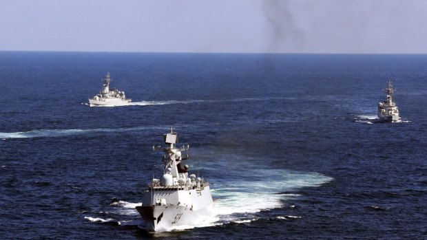 Chinese navy vessels taking part in a drill in 2012. 
