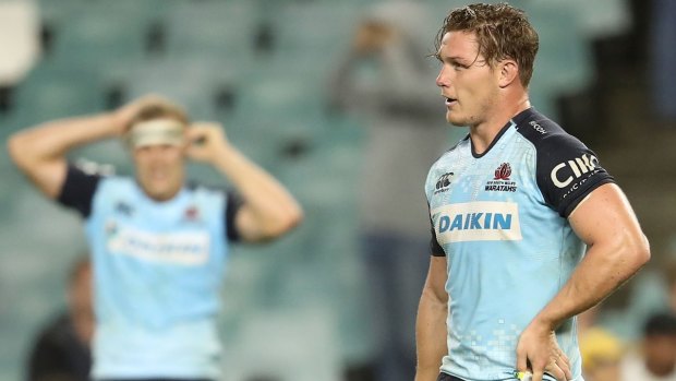Where's the joy: Michael Hooper was one of the many dejected-looking Waratahs - and fans - after the loss to the Brumbies.