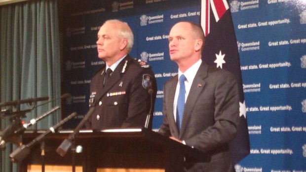 Deputy police commissioner Ross Barnett and Premier Campbell Newman.